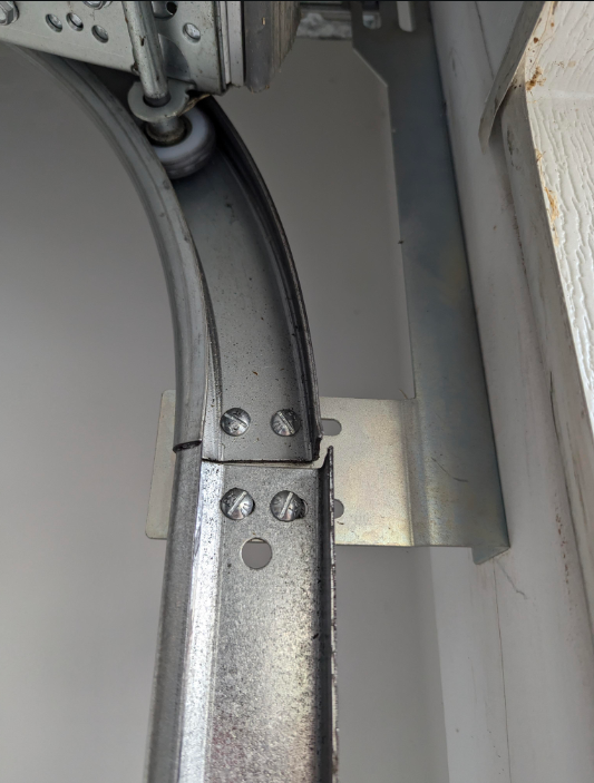 Garage door tracks need expert repair.